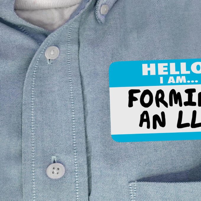 Men's shirt with a name tag that says hello I am forming an LLC