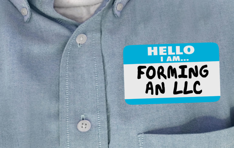 Men's shirt with a name tag that says hello I am forming an LLC