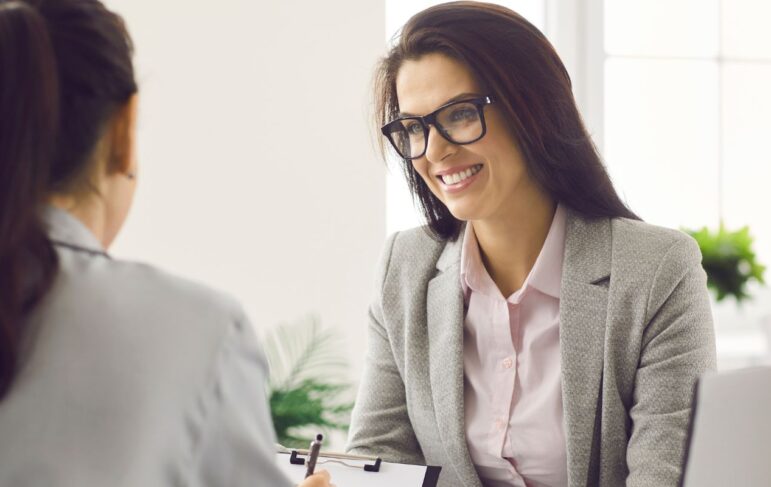 woman talking to an attorney about a case